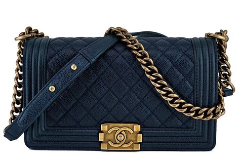 chanel navy caviar boy bag|The Ultimate Guide to the Chanel Boy Bag .